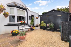 Side and Outbuilding- click for photo gallery